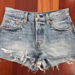 Light blue Levi shorts.